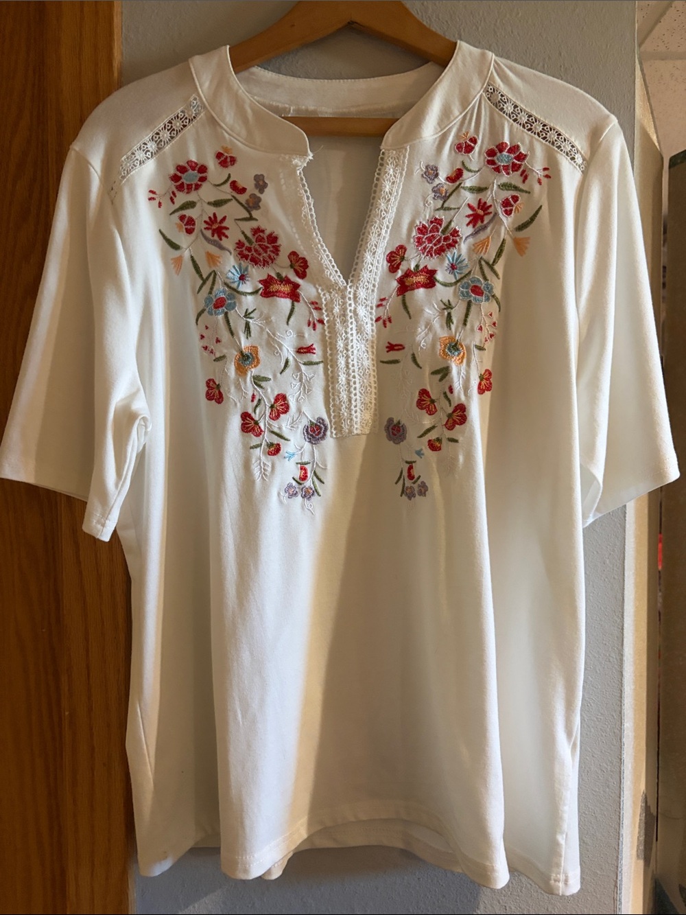 Embroidered floral V neck top